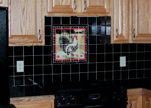 Rooster painting transferred onto ceramic tiles to create tile mural for kitchen backsplash