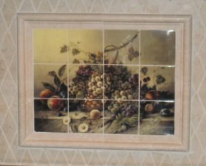 Corrado Pila painting transferred onto marble tiles to create tile mural for kitchen backsplash