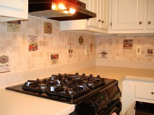 Wine labels transferred onto marble for kitchen backsplash