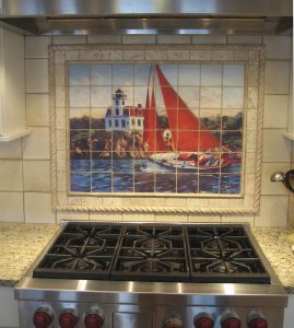 Seascape painting transferred onto marble tiles to create tile mural for kitchen backsplash