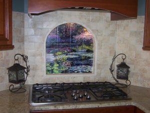waterlilies painting transferred ontoceramic tiles to create tile mural for kitchen backsplash