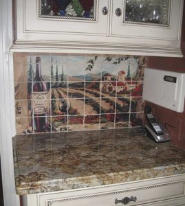 Wine art painting transferred onto marble tiles to create tile mural for kitchen backsplash