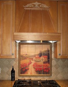 Tuscan mural on tumbled marble tiles for a kitchen backsplash